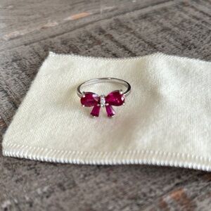 Elegant Bow Ring with Red Gemstones